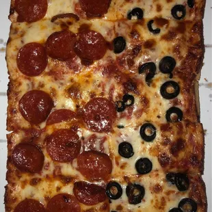 Pizza with Pepperoni and Black Olives