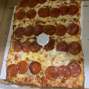 a slice of pepperoni pizza