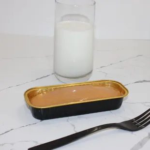 a fork and a glass of milk