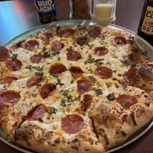 Pepperoni pizza with green chili