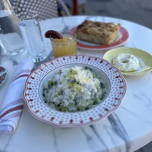 Caesar saladbread service &amp; Italian Margarita.
