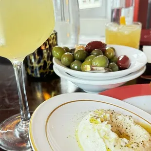 Arancello Spritzmarinated olivesand whipped ricotta with rosemary focaccia.