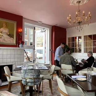 a dining room with a fireplace