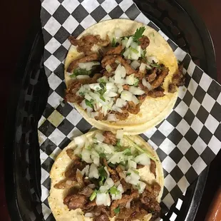 Amazing pastor tacos and wet burrito
