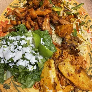 Federation (mix of pasta and rice) with a side of fried  fish and chicken kutelati