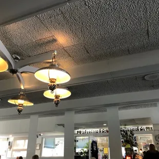 a ceiling with chandeliers