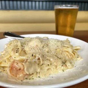 a plate of pasta and shrimp