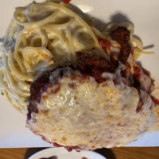 a plate of pasta and meatballs