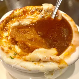 Inside the French onion soup, rich dark beef broth.. so good!!