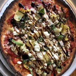 This pizza was AMAZING!!!  Cauliflower crust, goat cheese, feta cheese, mushrooms, basil leaves, artichoke hearts, tomatoes....THE BEST!!!
