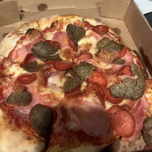 Custom pizza with pepperoni, bacon, meatballs, &amp; ham