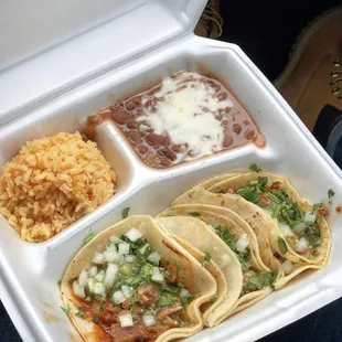 a meal in a styrofoam container