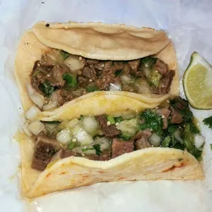 Soggy tortillas, wet asada, lengua pretty good, 3/5