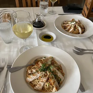 Front- pasta with spicy Diablo sauce , Back - past with Cognac cream sauce