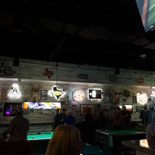 people playing pool and billiards