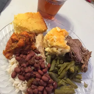 Corn bread, rice and beans, greens, chicken and beef