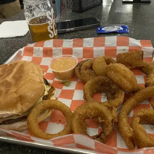 a burger and onion rings