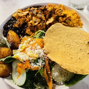 The Bowl - grilled chicken, black beans, rice, maduros, salad with apples &amp; corn