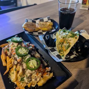 Lunch nacho fries, patacones side, chicken street taco