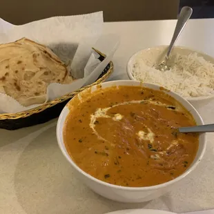 Malai kofta, paratha, and rice.