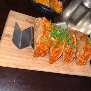 Petite, crispy, and fun. Szechuan Mini Chicken Tacos