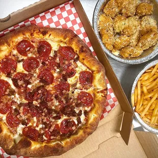 MEAT LOVERS with cheese crust and Bonless garlic parmesan wings on the side