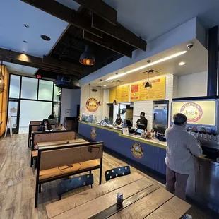 a woman standing at the counter