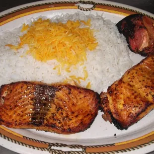 a plate of meat and rice