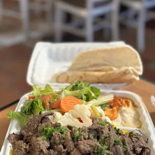 Beef Shawarma Plate with salad and hummus, and fresh baked pita to dip into that hummus!