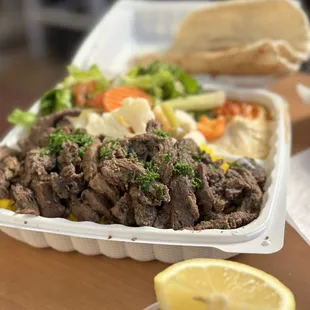 Plenty of steak in the beef shawarma plate, plus a stack of healthy veggies and some delicious hummus