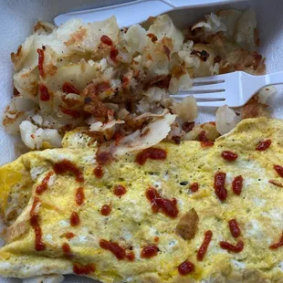 an omelet and potatoes