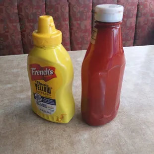 Totally dirty condiment bottles.