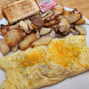 Omelet breakfast with fresh baby red American fries