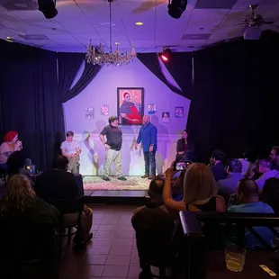 a man and woman on stage