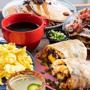 Hash-a-Burrito! 
Smoked ham, Scrambled eggs, Mama's potatoes, grilled onions, cheddar and mozzarella,
wrapped in a tortilla, salsa