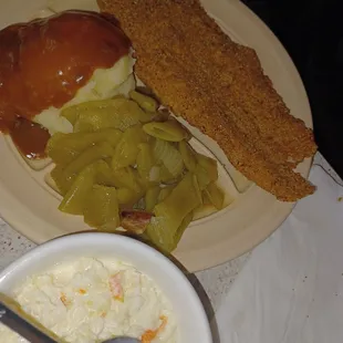 Breaded catfish with mashed potatoes, coleslaw and green beans.