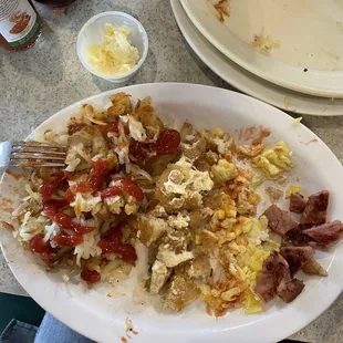 Pancakes, eggs, ham, hash browns