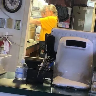 The one with the braid is Mary. If you want to experience racism let her serve you.