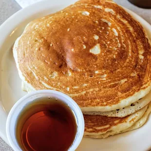  stack of pancakes and a cup of tea