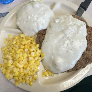 Chicken fried steak with sweet corn and mashed potatoes