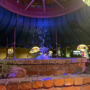 Fountain in center of restaurant