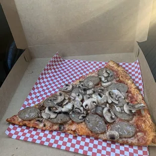 Single slice with mushrooms and sausage