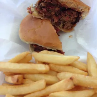 Tender pulled pork sandwich with crispy French fries