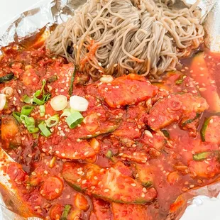 a plate of pasta and vegetables