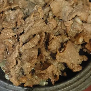 2. LA Kahl-bee, sliced short rib Min