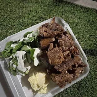 Spare ribs with rice, spinach &amp; potato salad