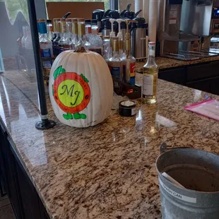 a pumpkin on a kitchen counter