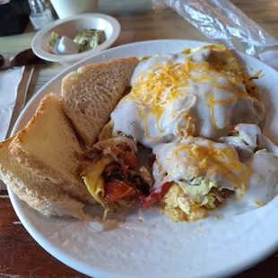 My kitchen omelet = egg, sausage, onion, mushroom, tomato, and diced potatoes.