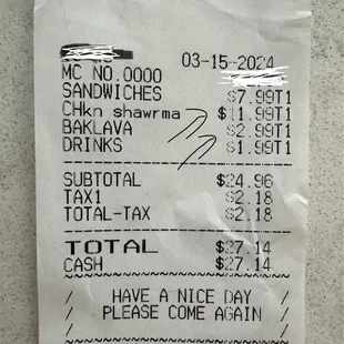 Receipt showing that he charged us more than what was on the menu.
