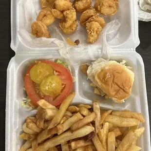 Fried shrimp, French fries, salad, and a roll!